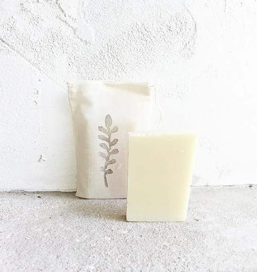 Hand-stamped drawstring bag with artisan soap.